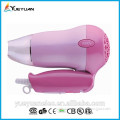 Summer hot selling Compact mini size folded handle cute injection pink color 1000w low voltage hair dryer